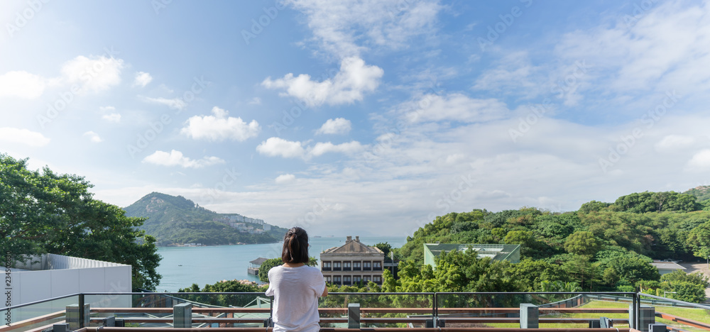 Obraz premium Young Asian woman travel at the beach in Hong Kong