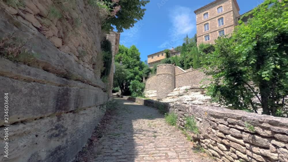 Walking with a video camera in the ancient French town of Gordes. Provence. France. Slow motion.