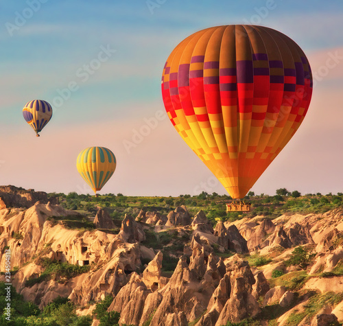 Hot air balloons in the air, popular tourist attraction in Cappadocia, Turkey