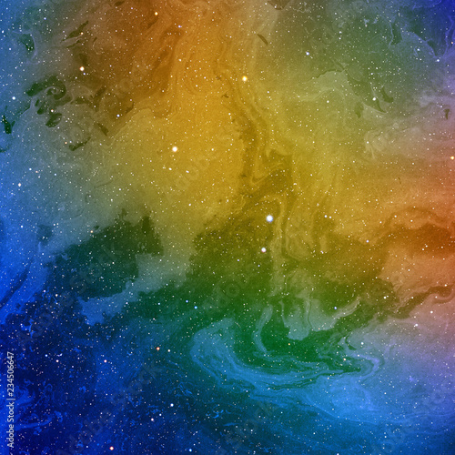 Colorful abstract space background on watercolor paper. Marble ink nebula image. Hand painted cosmos and stars.