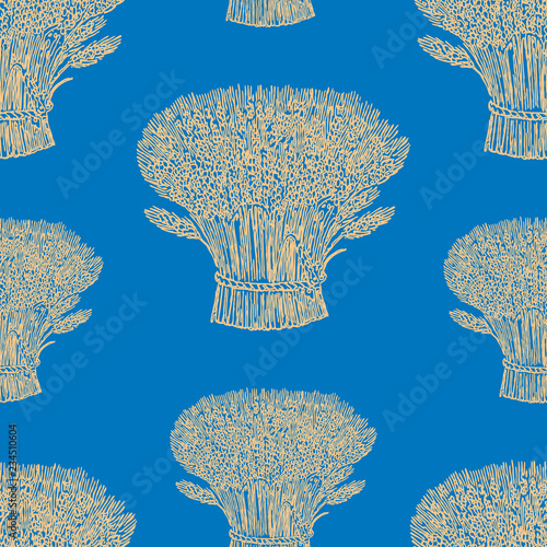 Seamless pattern of the sheafs of ripe wheat