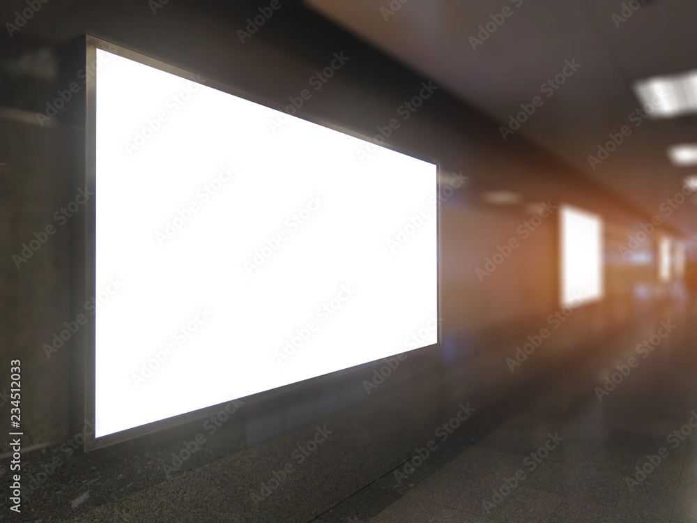 billboard big blank white LED screen perspective horizontal outstanding in subway side pathway people walking to train underground for display advertisement text template promotion new brand indoor.