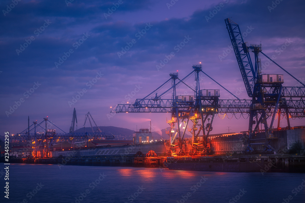 industrial background with cranes in Sestao port