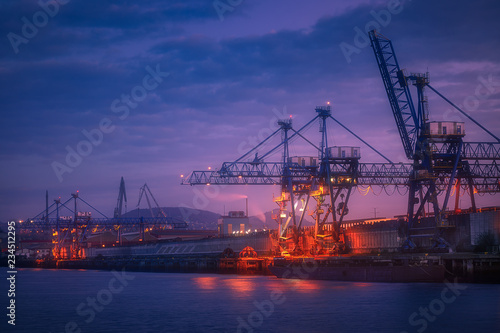 industrial background with cranes in Sestao port