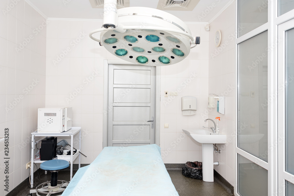 Equipment and medical devices in modern operating room. Surgical room modern equipment in the hospital.