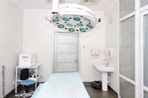 Equipment and medical devices in modern operating room. Surgical room modern equipment in the hospital. © Magryt