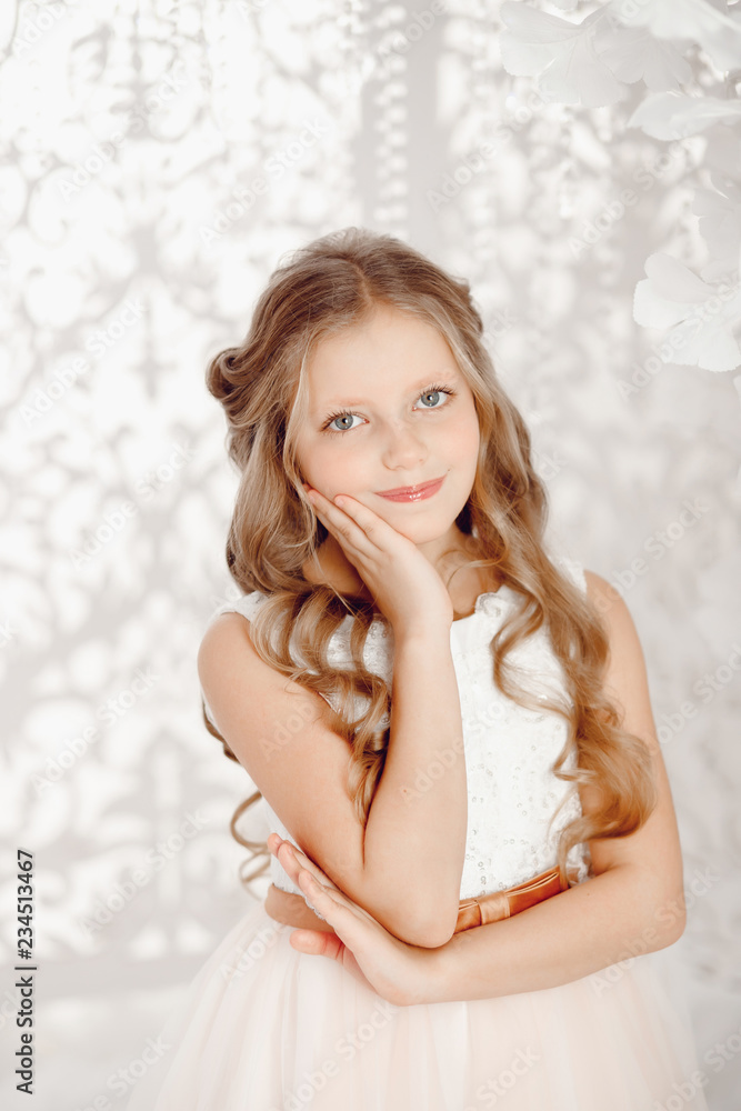 Portrait of beautiful child girl in white dress, concept christmas. Portrait of beautiful child girl in white dress, concept christmas.