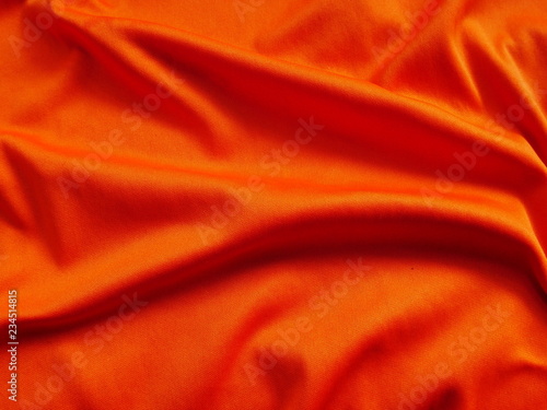 orange silk cloth background,cotton fabric texture,orange sportswear clothing