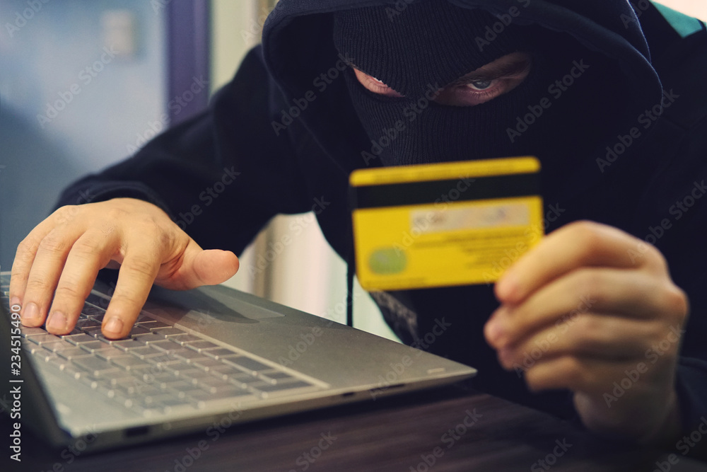 Man in robber mask uses internet, bank account and credit facilities ...