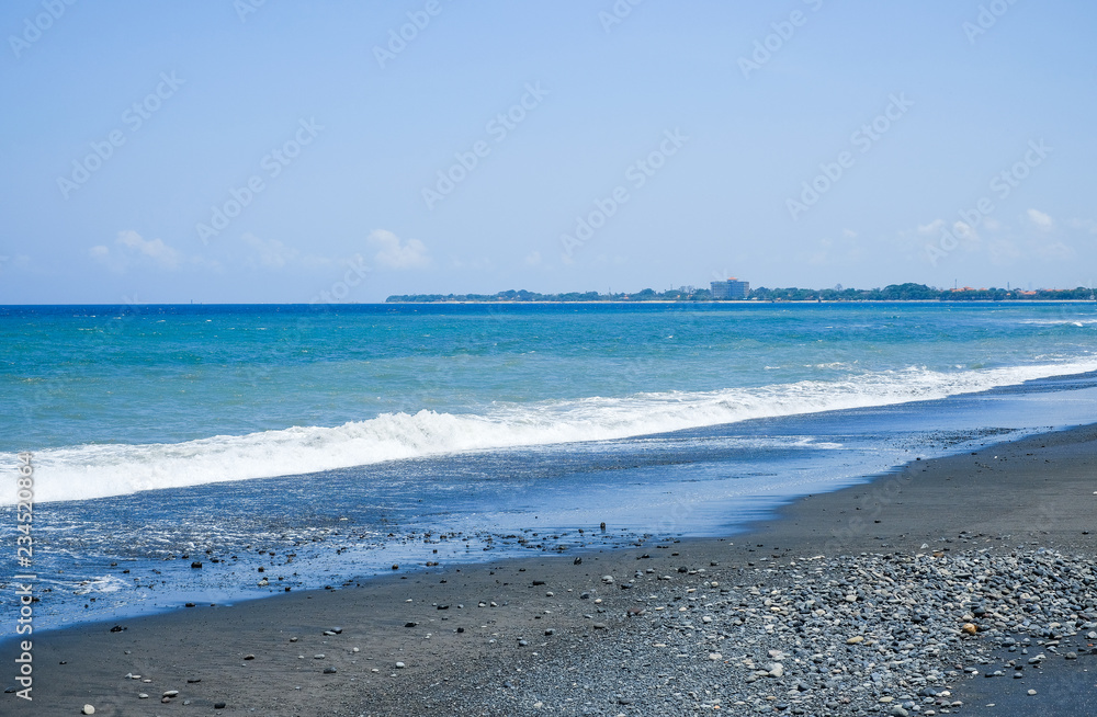 Black volcanic sand beach, Bali