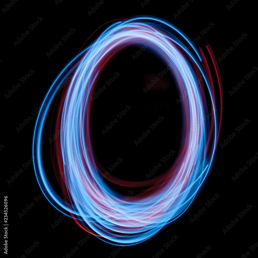 The neon number 0, blue light image, long exposure with colored fairy lights, against a black background The neon number 0, blue light image, long exposure with colored fairy lights, against a black background