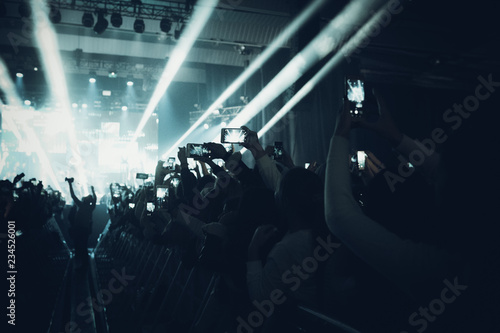 Obraz na płótnie MINSK, BELARUS - 20 SEPTEMBER, 2018: Crowd at concert - retro style photo