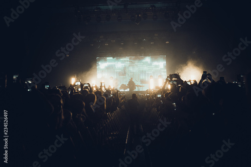 MINSK, BELARUS - 20 SEPTEMBER, 2018: Crowd at concert - retro style photo photo