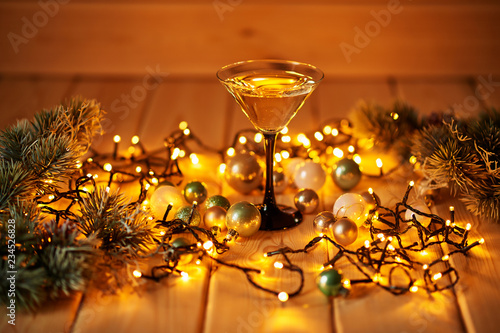 Christmas drinks on table. Christmas  decorations with lights background. Happy New Year! Christmas greeting card. Winter card template. Xmas concept. Holiday Banner. Feast of Nativity. 