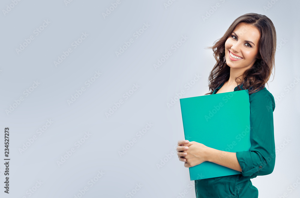 Businesswoman with folder, on grey Businesswoman with folder, on grey
