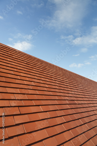 New plain clay roof tiles