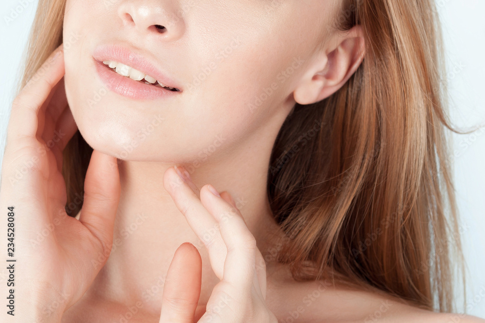 Young beautiful girl with clean perfect skin close-up Young beautiful girl with clean perfect skin close-up