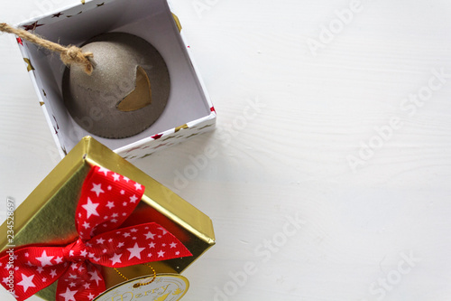 Gift box with Christmas Decorative bell inisde photo