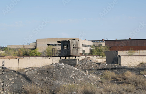 Abandoned buildings of an old industrial factory  Ruins for design background.