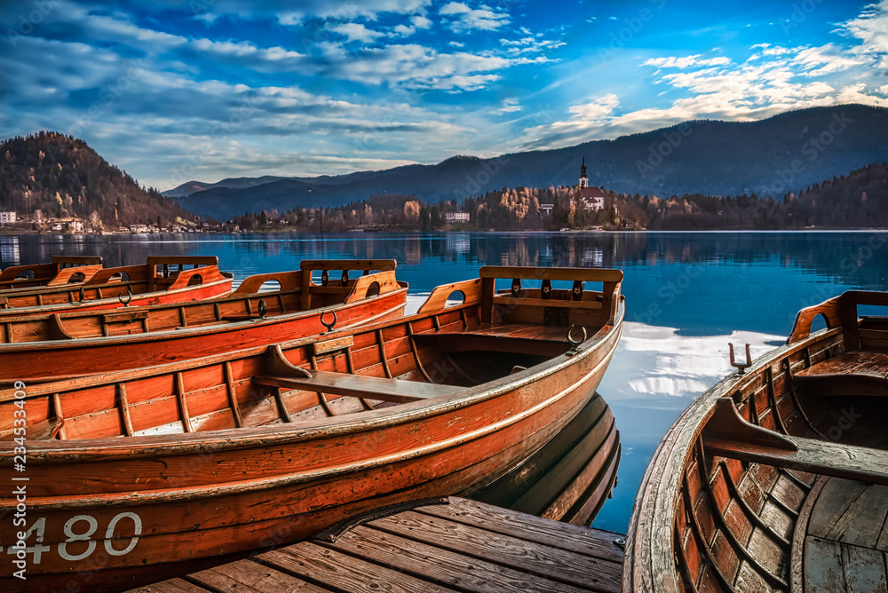 Wooden boats on the coast of the gorgeus Lake Bled in Slovenia