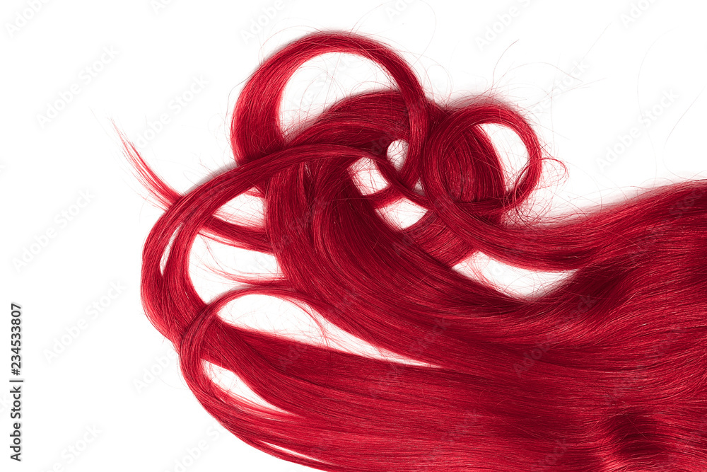 A strands of long, twisted, pink hair isolated on white background A strands of long, twisted, pink hair isolated on white background