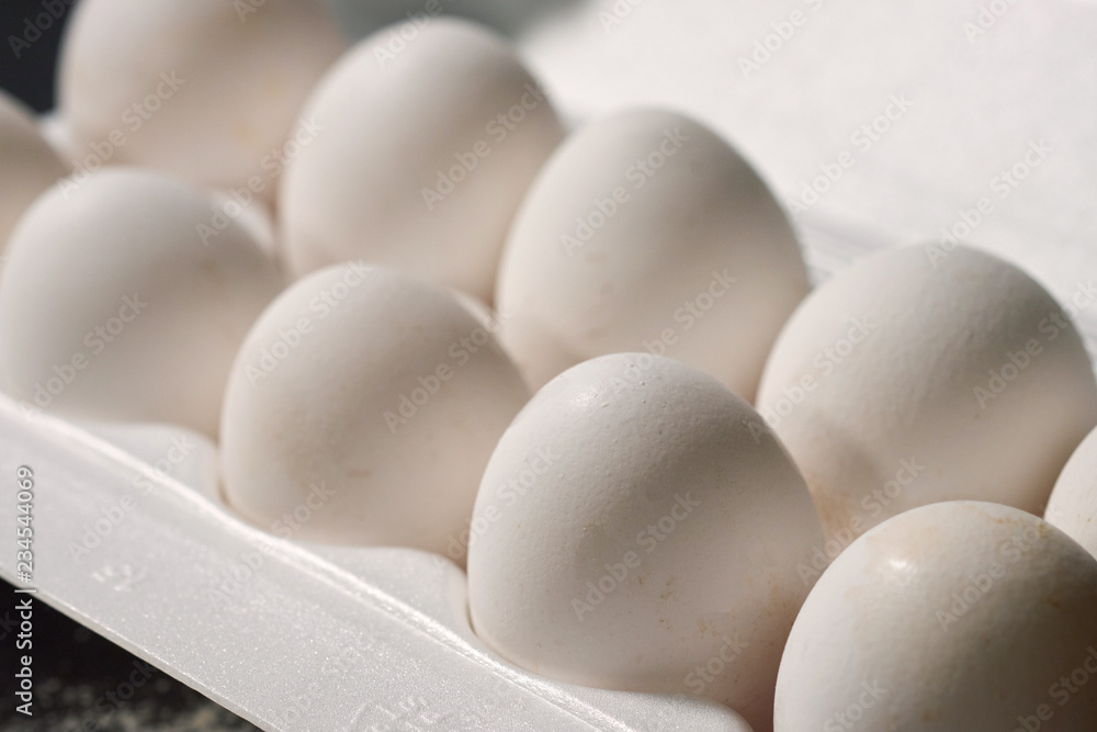 white eggs in a white box, selective focus white eggs in a white box, selective focus