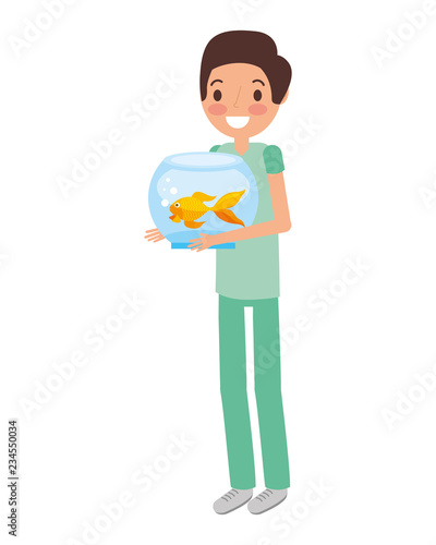boy holding goldfish on bowl