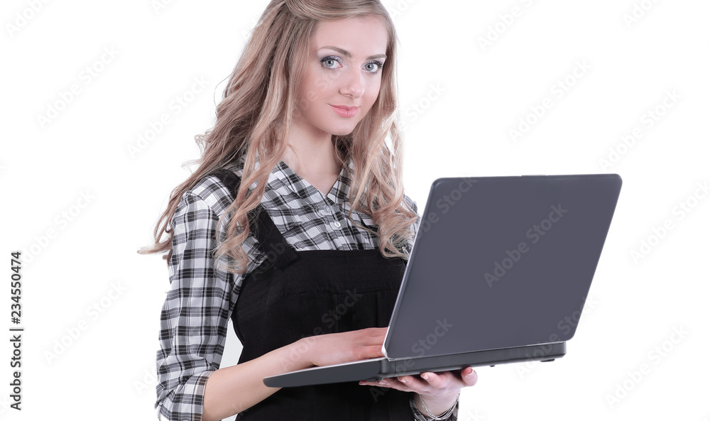 young business woman standing with an open laptop. young business woman standing with an open laptop.