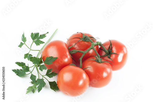 ripe tomatoes on a branch .isolated white background.