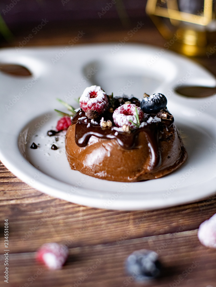 Chocolate cream mousse cake with fresh berries. delicious dessert. Chocolate cream mousse cake with fresh berries. delicious dessert.