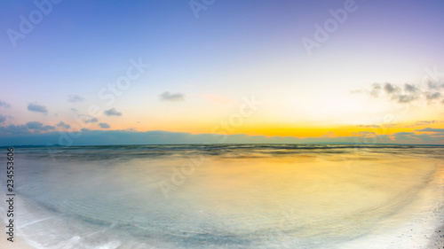 Sunrise at the ocean as a background