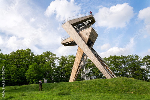 Observation deck on beautiful Salas lookout tower, Uherske Hradiste district, Zlin region, Moravia, Czech Republic, summer blue cloudy sky copy space photo