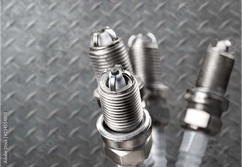 Billede på lærred Ignition spark plug with platinum electrode. Automotive spark