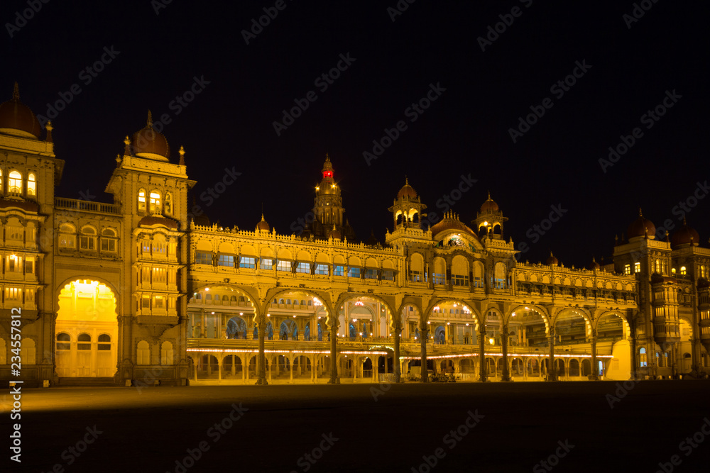 Golden Mysore Palace at night in Karnataka, India. Royal building, historical architecture concepts