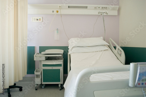 view of a hospital room, electronic bed with clean sheets, ready for patient, hygiene, medicine, doctor, health, Italy © Angela