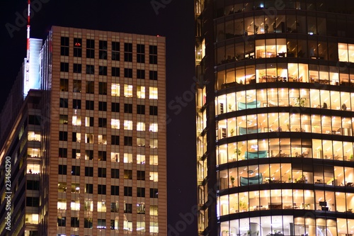 Modern office building at night. Night lights, city office building downtown, cityscape view