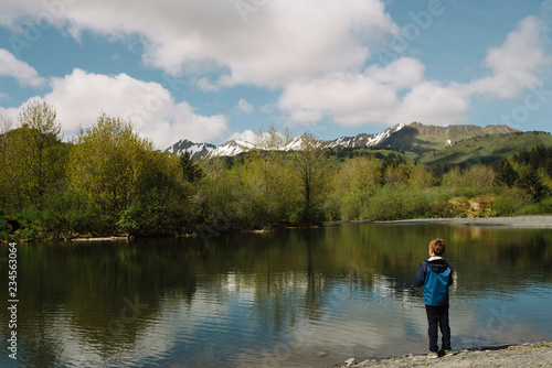 Young boy fishing at a lake