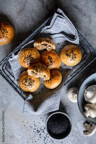 Baked mushroom and cheese buns studded with black cumin