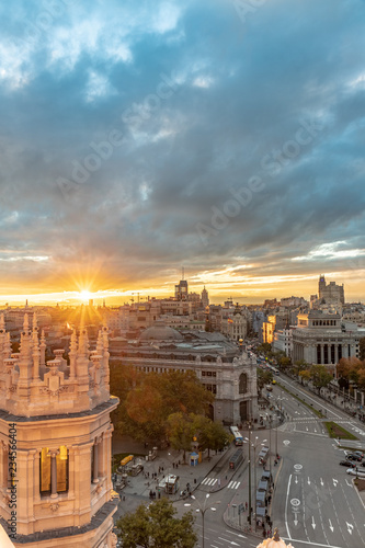 From the Cybele Palace the skyline of Madrid, Spain. View of the sunset in the Spanish capital city more tourist and visited of Europe with new and old buildings