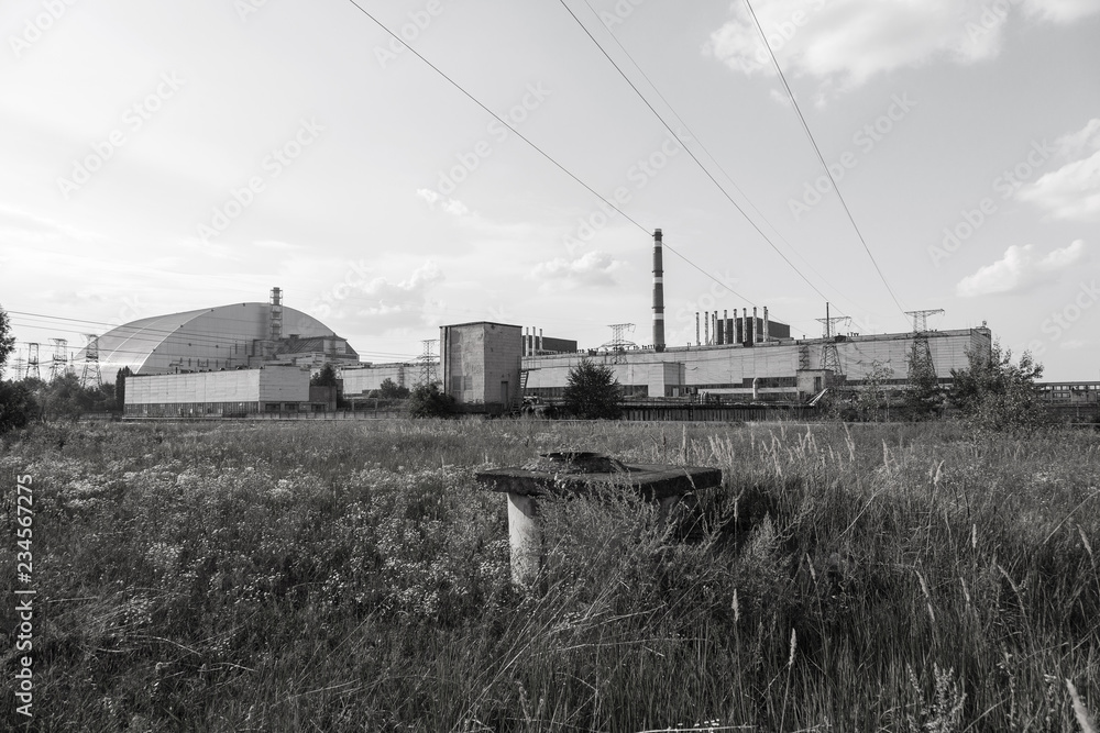 Reactor 4 at the Chernobyl nuclear power plant with a new confinement. Global atomic disaster. Chernobyl Exclusion Zone. Pripyat in the area of the sarcophagus over a blasted nuclear reactor Reactor 4 at the Chernobyl nuclear power plant with a new confinement. Global atomic disaster. Chernobyl Exclusion Zone. Pripyat in the area of the sarcophagus over a blasted nuclear reactor
