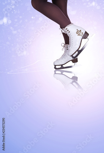 Slender woman's legs in ice skating boots