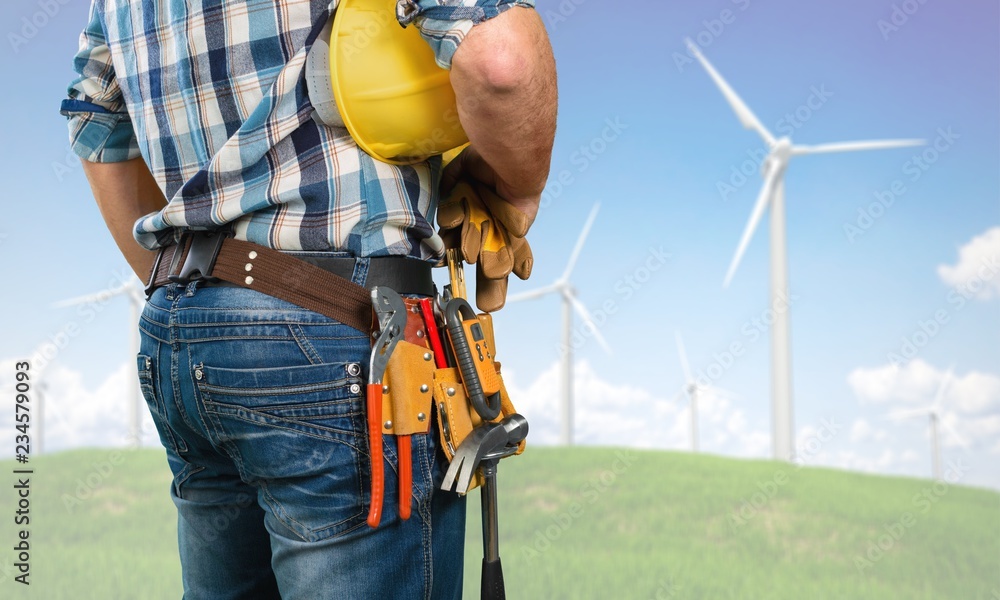 Worker with a tool belt. Isolated over  background.