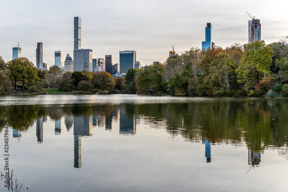 New York City's Uptown Buildings Reflected in Central Park's Pond New York City's Uptown Buildings Reflected in Central Park's Pond