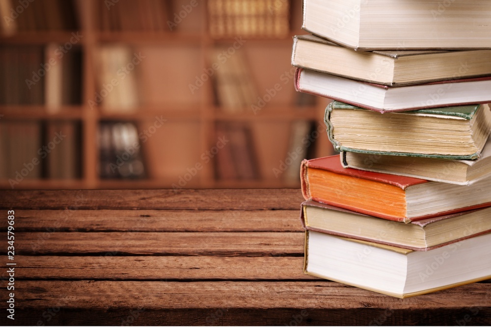 Open book on old wooden table. Open book on old wooden table.
