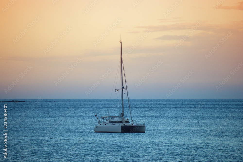 Ship sailing in the Mediterranean at sunset Ship sailing in the Mediterranean at sunset