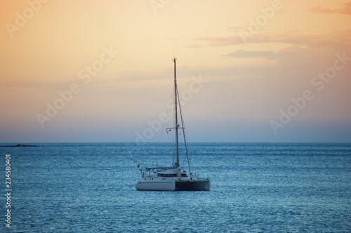 Ship sailing in the Mediterranean at sunset