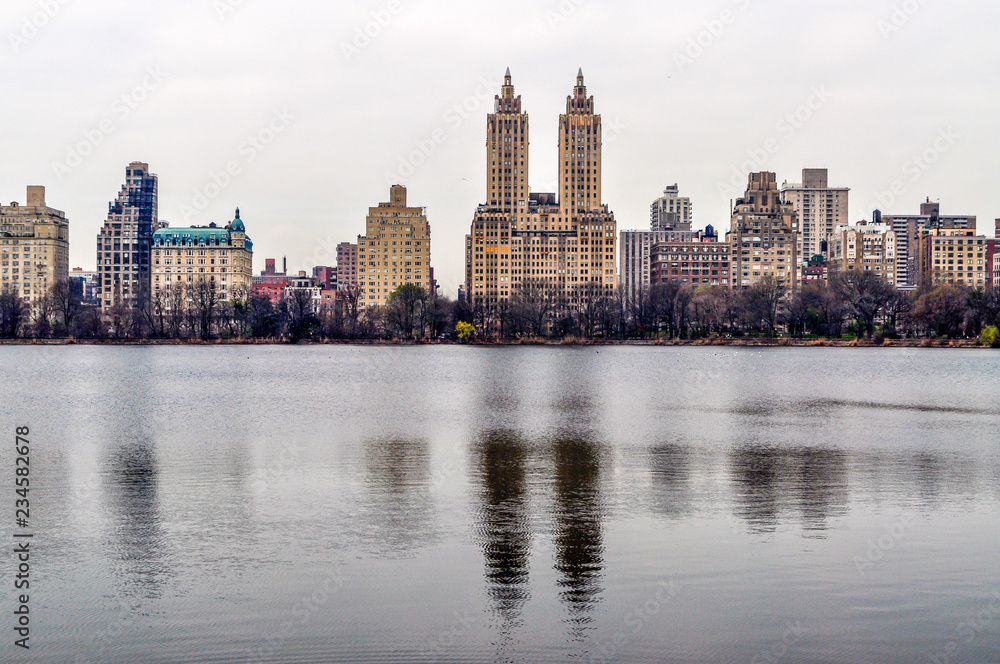 Central Park West Reflected in the Waters of the Jacqueline Kennedy Onassis Reservoir in New York City's Central Park