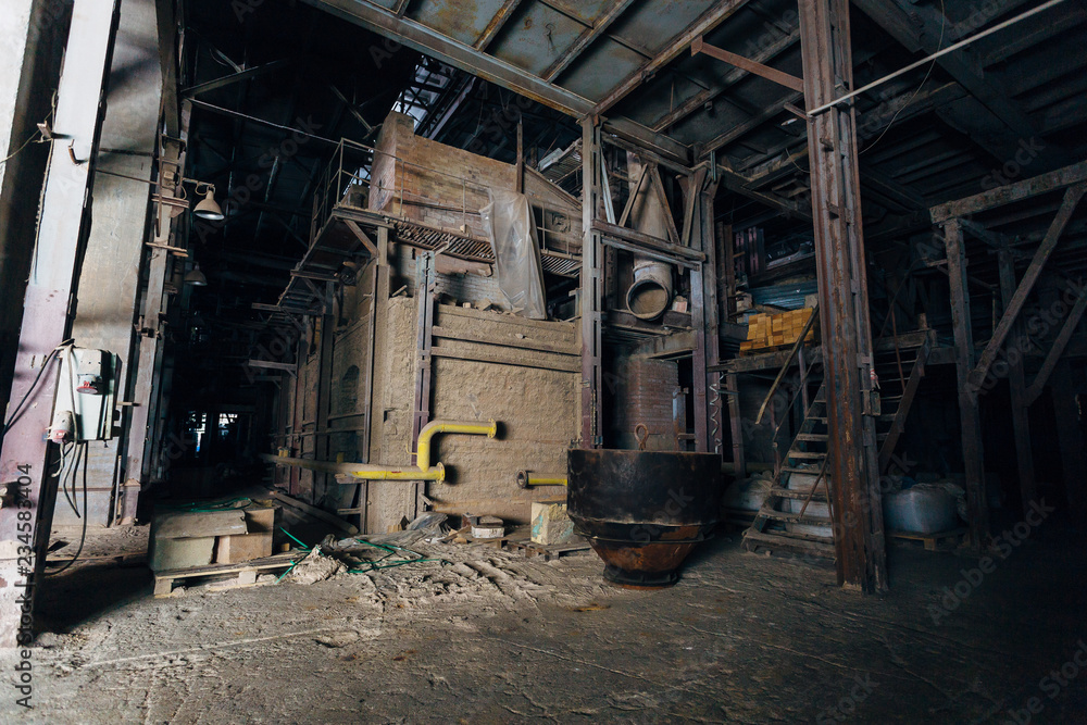 Old brick industrial stove for melting glass in abandoned factory Old brick industrial stove for melting glass in abandoned factory