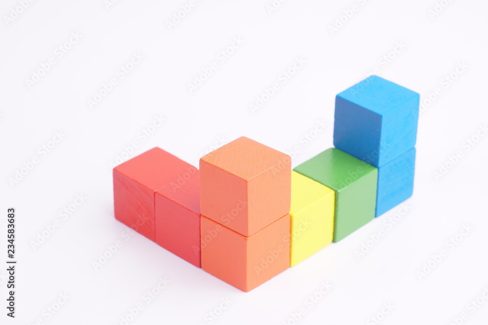 Colorful wooden cube isolated on white background. Colorful wooden cube isolated on white background.