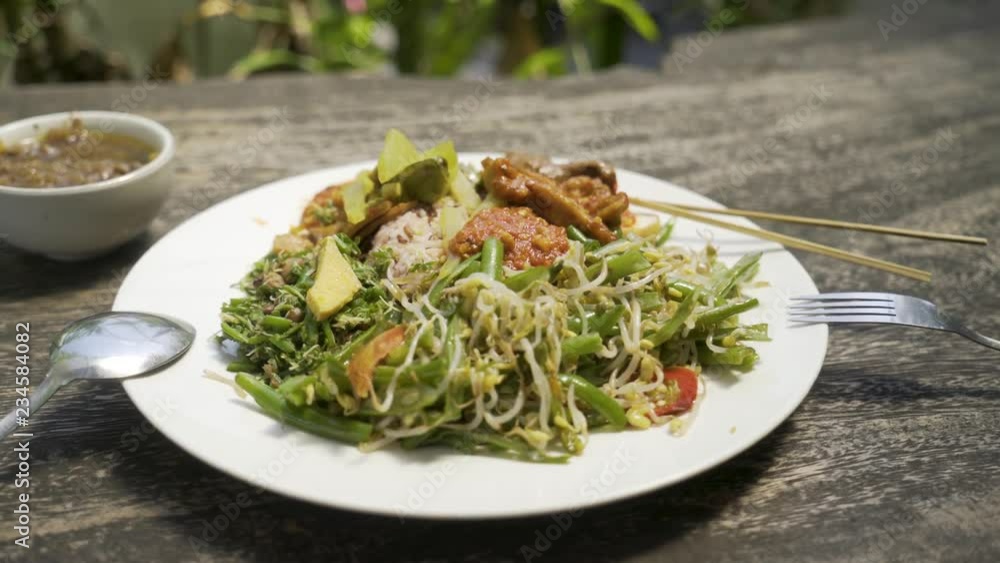 Close up of an Indonesian dish. Vegan nasi campur Close up of an Indonesian dish. Vegan nasi campur